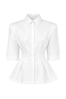 Izakova EDISA shirt in off-white, casual long-sleeve shirt with a relaxed fit and button-up front, displayed on a hanger.