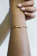 Gold plated silver XAVI bracelet with diamond accents from EDXÚ, showcasing its elegant design and fine craftsmanship.