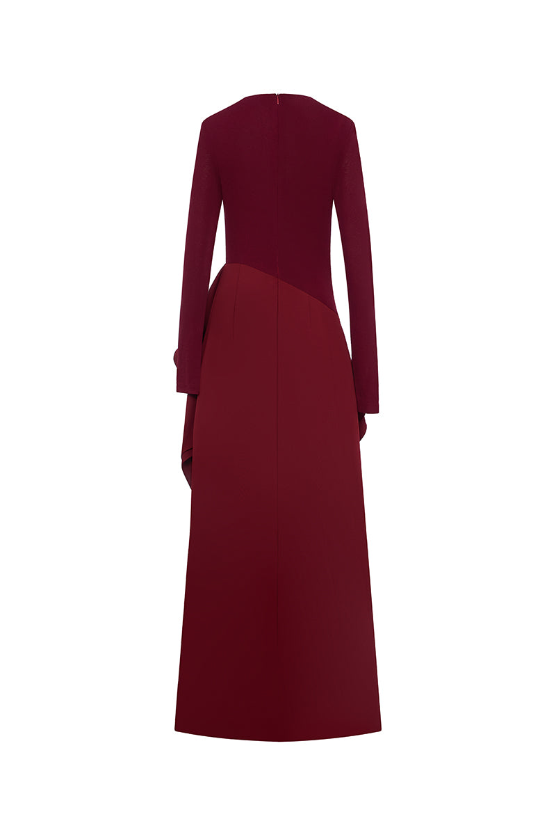 Red spandex jersey maxi dress by EEGEN STUDIO, featuring a fitted silhouette and flowing length, perfect for stylish occasions.