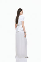 White taffeta silk gown by EEGEN STUDIO, featuring elegant draping and classic design, perfect for formal occasions.