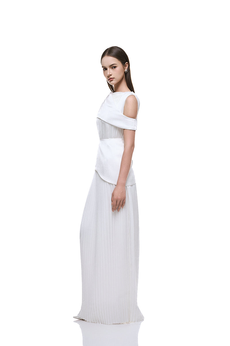 White taffeta silk maxi dress by EEGEN STUDIO, featuring elegant fabric and flowing design, showcased on a model.