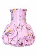 Back view of Gigii's April mini dress with a stylish design, showcasing its fit and fabric details.