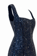 Urban Muse Electra embellished navy mini dress styled with intricate embellishments and a fitted silhouette.