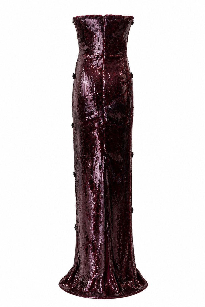 Urban Muse Ember Gown in Burgundy, elegant evening dress with flowing fabric and intricate details, perfect for formal occasions.