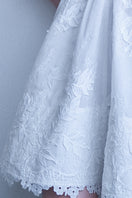 White Emma dress by AISA, a stylish mini dress with a fitted silhouette, showcased in a high-quality image.