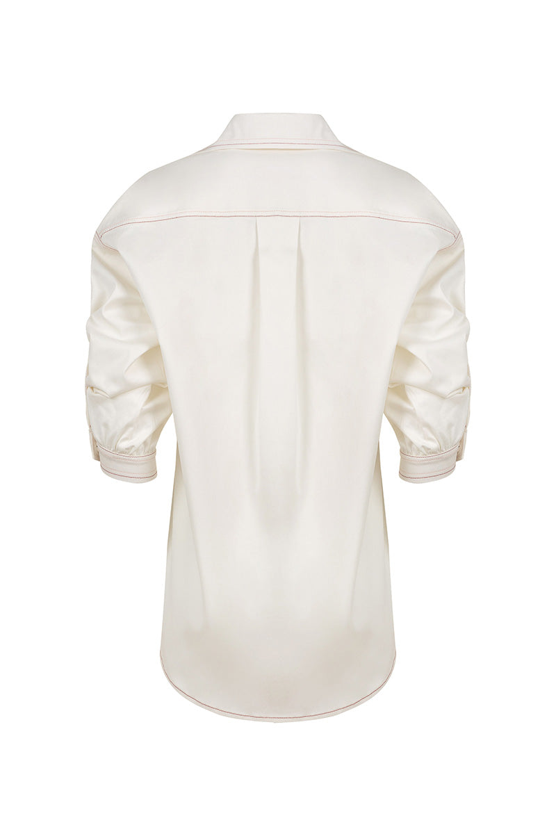 Estefania honey rose blouse, stylish shirt with floral pattern, featuring a relaxed fit and elegant design.