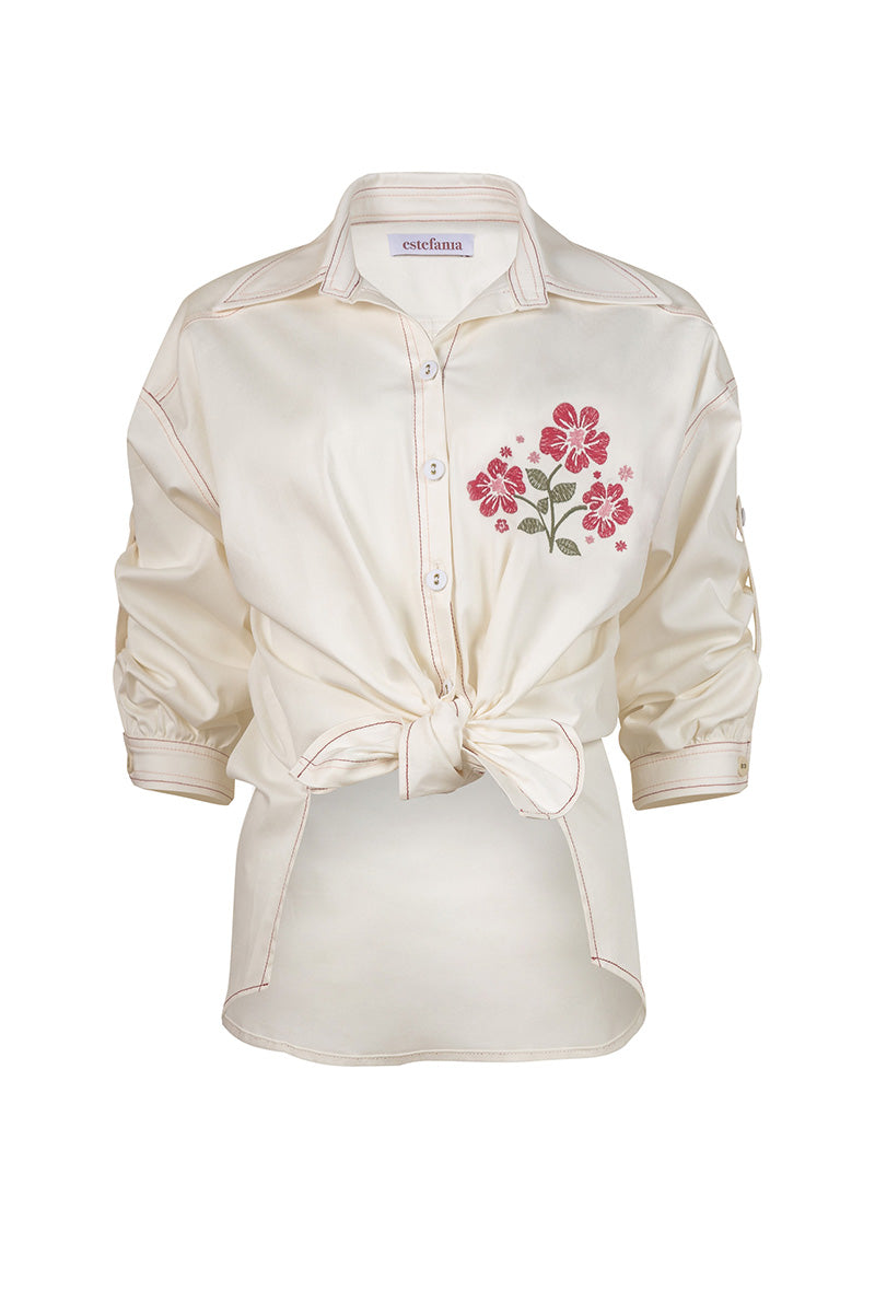 Estefania honey rose blouse, stylish shirt with delicate floral design, lightweight fabric, and elegant fit displayed in the image.