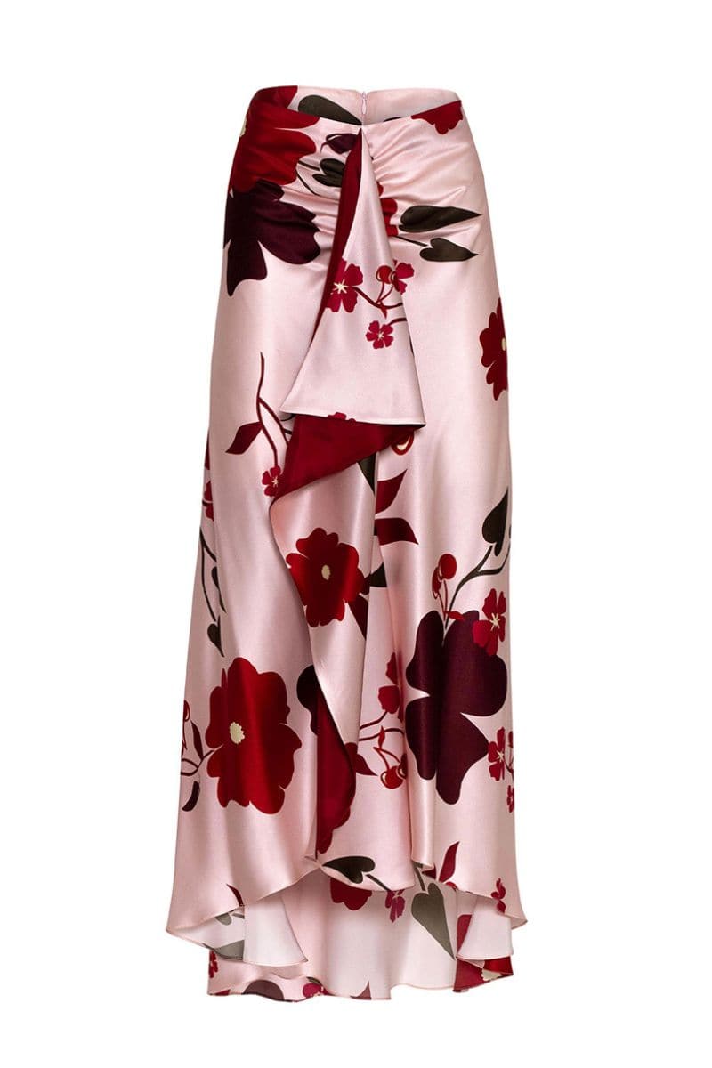 Estefania Symphony printed pink midi skirt with cherry Picante print, showcasing a flowy design and vibrant pattern.