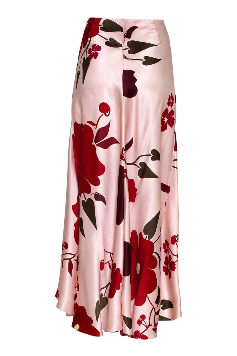 Pink midi skirt by Estefania with a cherry picante print, featuring a flowy design and vibrant pattern.