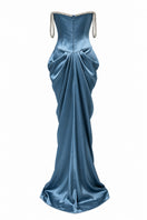 Blue EVANIA gown by URBAN MUSE, featuring elegant fabric and detailed design, displayed on a model.