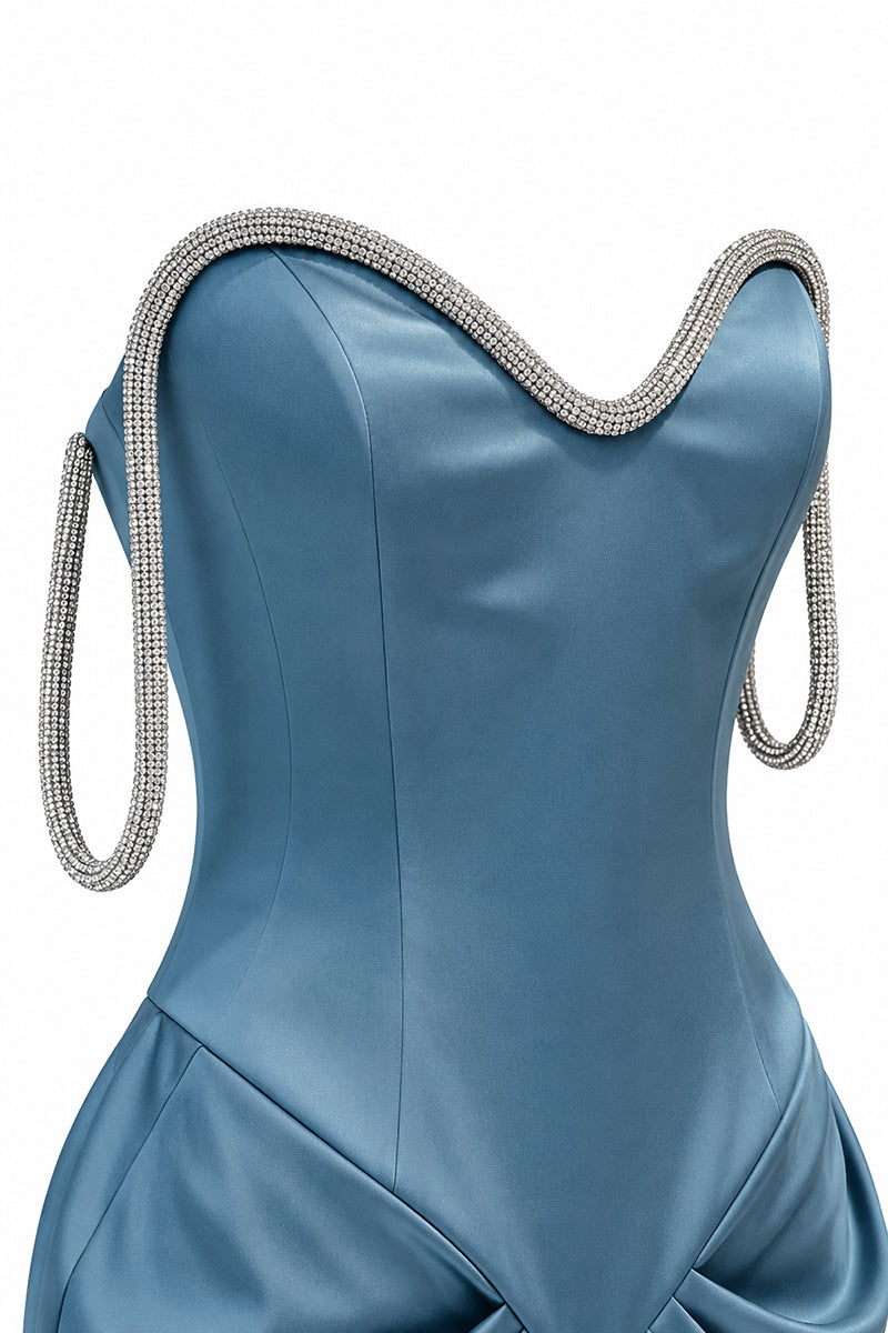 Blue Evania gown by Urban Muse, elegant long dress with flowing fabric, perfect for formal occasions.