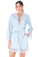 Blue kimono loungewear by Ellipse Lingerie, featuring soft fabric and relaxed fit, displayed on a hanger.