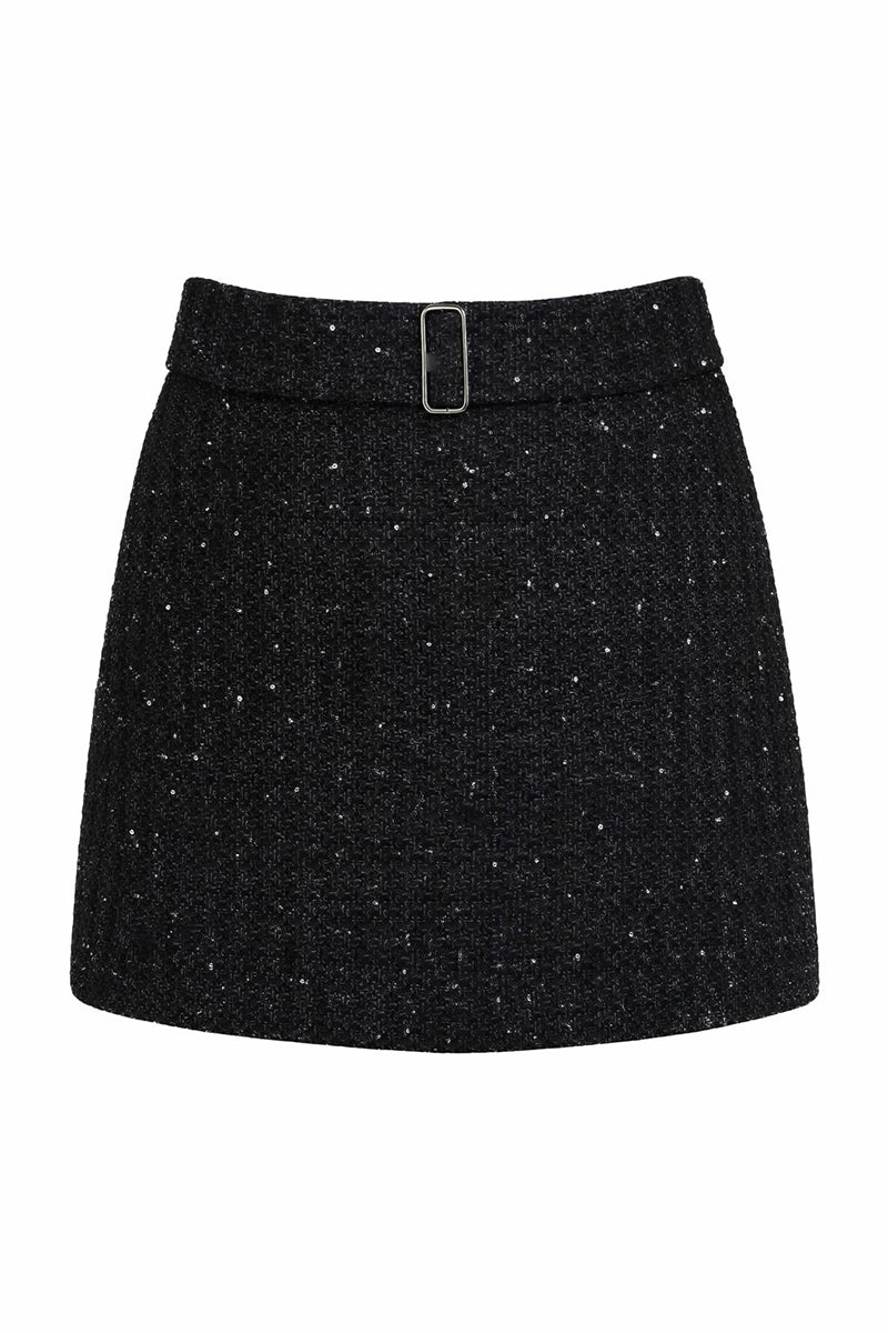 Aquarel Studio Iris Mini Skirt in black, shown on a model, featuring a sleek, fitted design perfect for stylish casual wear.