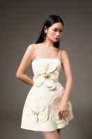 Light yellow CULT MIA X HAPPY CLOTHING Anahi fit and flare mini dress displayed on a hanger.