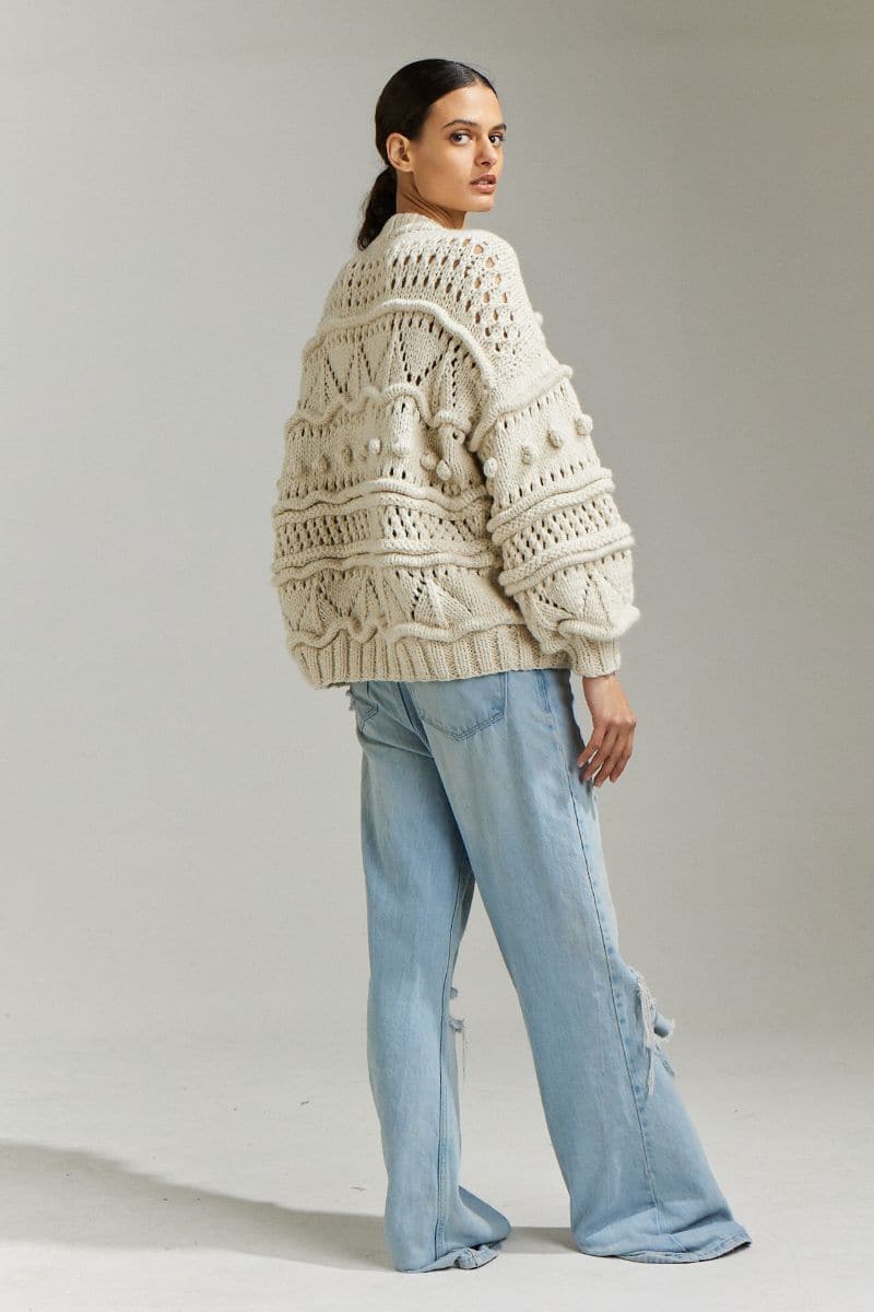 Off-white Brigitte Bomber Cardigan by First Born Knits, shown in XS/S size, featuring a cozy, stylish knit design.