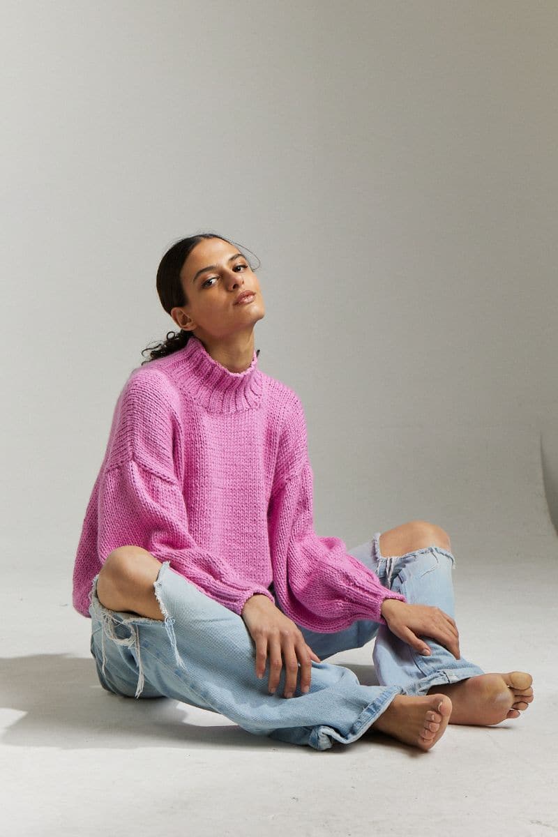 First Born Knits Candy Eve midi turtleneck sweater in candy pink, shown in XS and S sizes, soft knit fabric with a snug fit.
