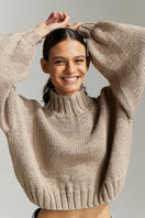 First Born Knits Evie cropped turtleneck sweater in taupe, showing the fitted sweater with a turtleneck and cropped length.