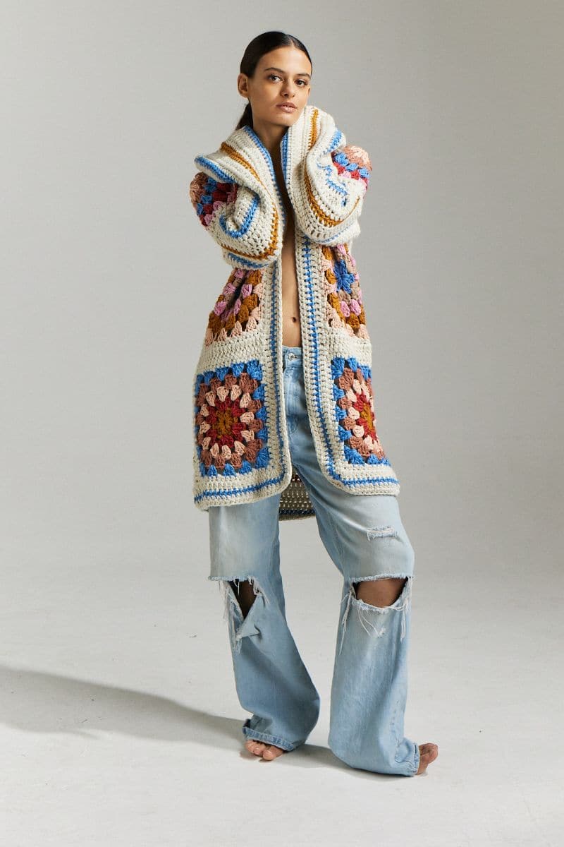 Multicolor first-born knits Farrah hand-crochet cardigan in XS/S, showcasing intricate crochet stitches and vibrant yarn details.
