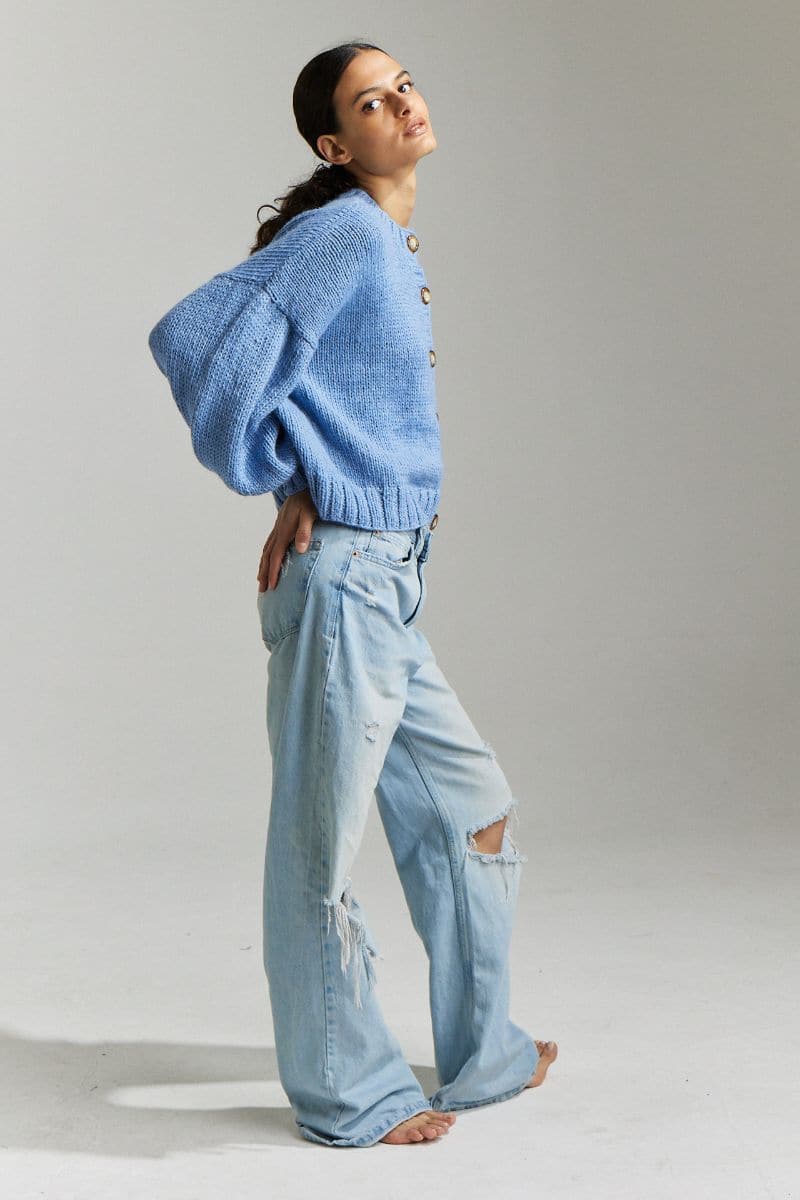 Sky blue Frenchie Midi Cardigan by First Born Knits, showing the cozy knitted cardigan with a relaxed fit and button-up front.