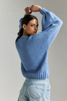 Sky blue Frenchie Midi Cardigan by First Born Knits, shown in size XS-S, featuring a cozy knit pattern and relaxed fit.