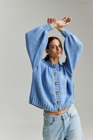 Sky blue Frenchie Midi Cardigan by First Born Knits, lightweight knit sweater with a cozy fit for women.