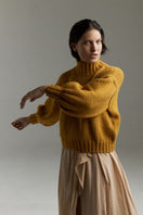 Mustard Eve midi turtleneck sweater by First Born Knits, featuring a cozy fit in XS to S size.