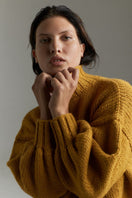 Mustard Eve midi turtleneck sweater by First Born Knits, soft knit fabric, fitted style, shown in mustard color, available in XS and S sizes.