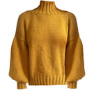 Mustard Eve midi turtleneck sweater by First Born Knits, showing close-up of ribbed collar and soft knit fabric in mustard yellow.