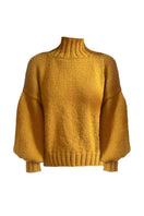 Mustard Eve midi turtleneck sweater by First Born Knits, showing close-up of ribbed collar and soft knit fabric in mustard yellow.
