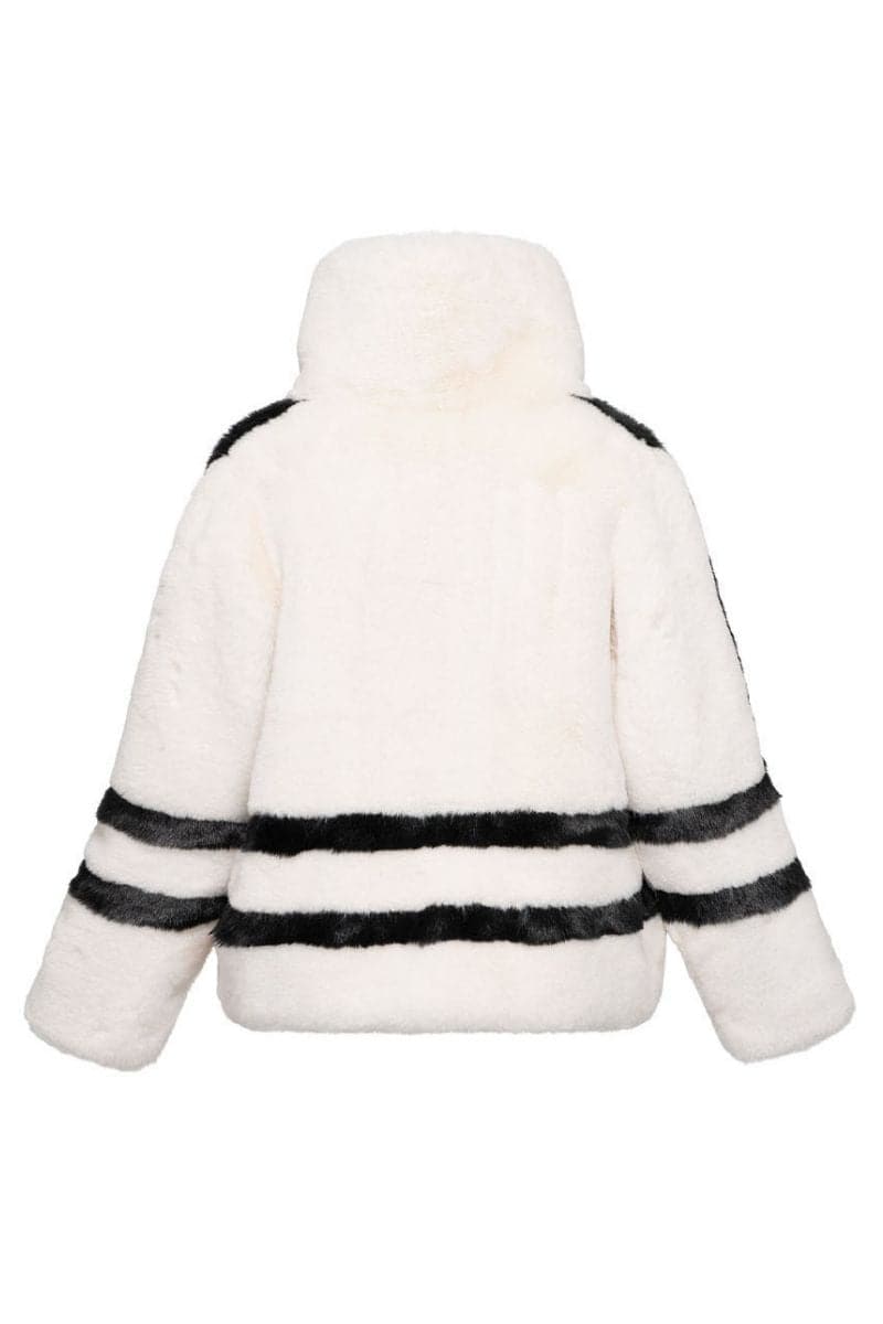 White sporty faux fur jacket by Fortini, featuring a stylish design with black accents, shown on a model in size XS.
