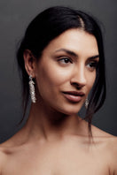 Silver crystal long drop earrings by Freya Rose featuring elegant, shimmering crystal details on sleek silver earrings.