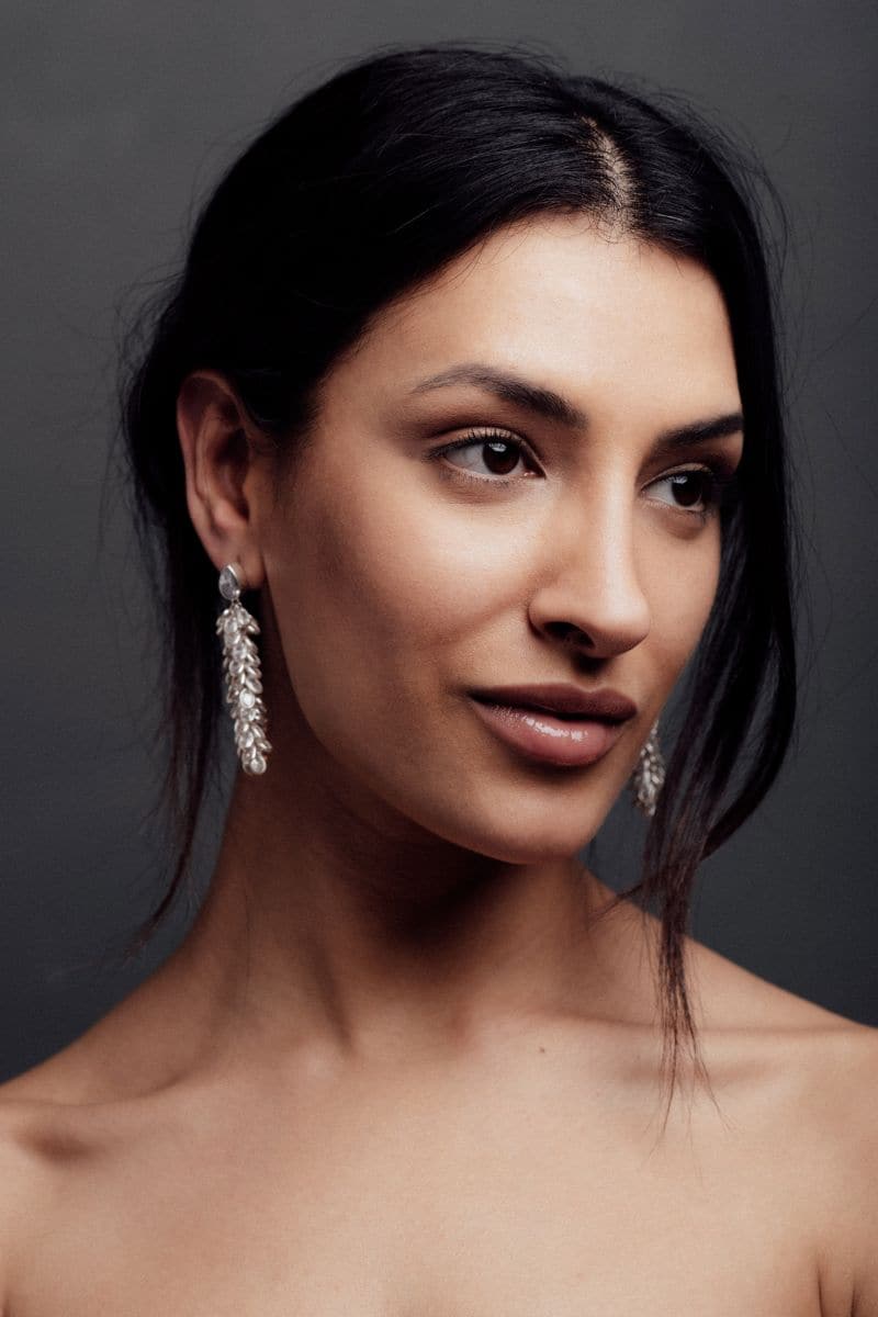 Silver crystal long drop earrings by Freya Rose featuring elegant, shimmering crystal details on sleek silver earrings.
