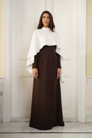 Joanna Andraos ivory evening gown with a flowing cape, front view, elegant design perfect for formal occasions.