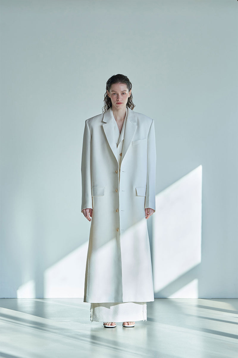 JINSUN Astral Couture wool coat in front view showing classic design, tailored fit, and neutral color for stylish winter wear.
