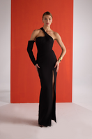 Joanna Andraos black gown with detachable sleeves, front view showing elegant design and flowing fabric.