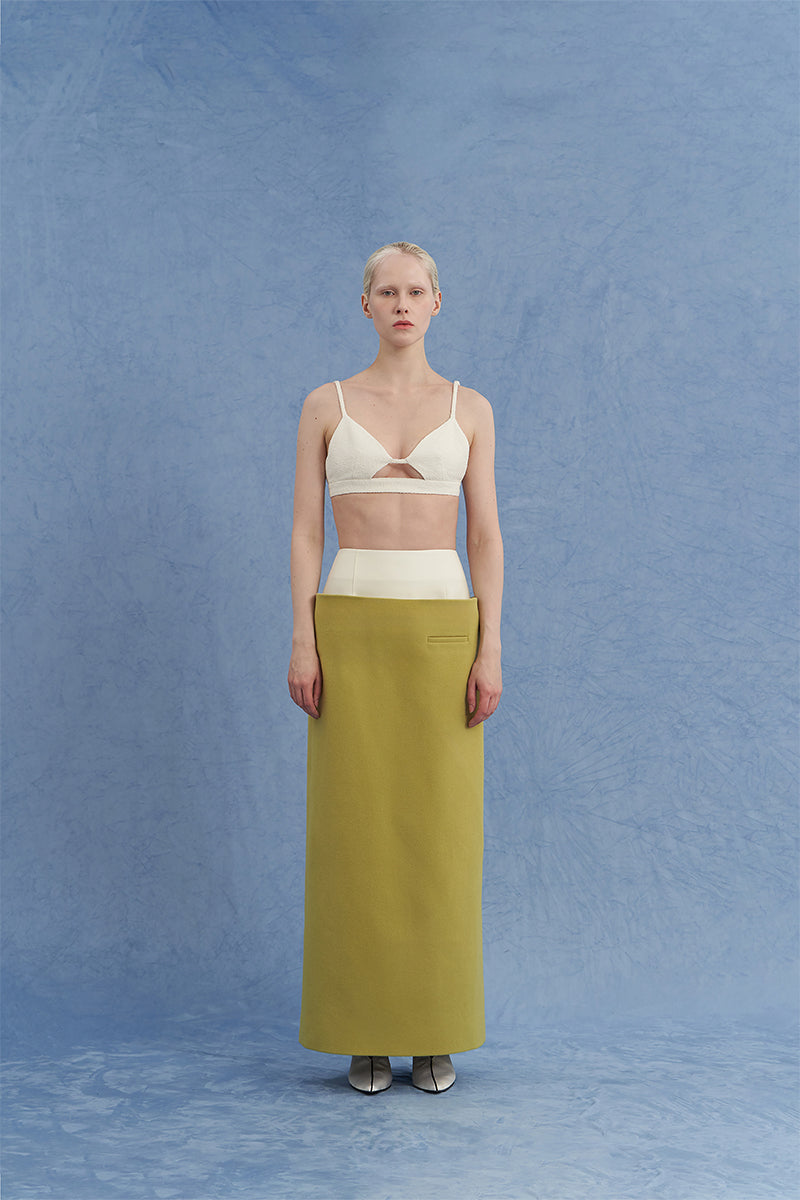 Green JINSUN maxi pencil skirt with a fitted front view, showcasing sleek design and elegant length.