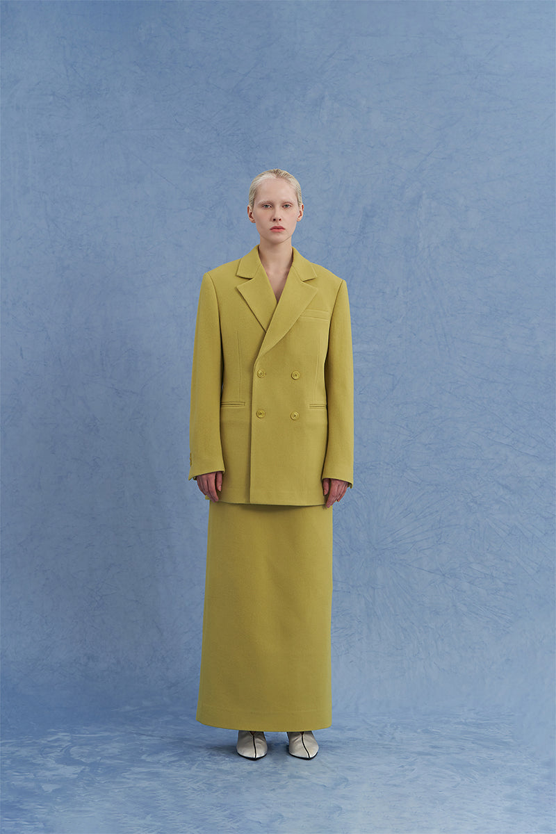 Green double-breasted wool jacket by JINSUN, shown from the front with classic lapels and tailored fit.
