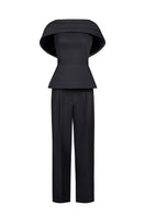 Joanna Andraos black crepe two-piece co-ord set with draped cape, front view showing stylish modern design and elegant fit.