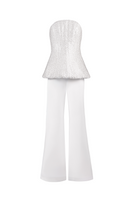 White Joanna Andraos corset top with flared trousers co-ord set, front view showing fitted corset and flowing trouser legs.