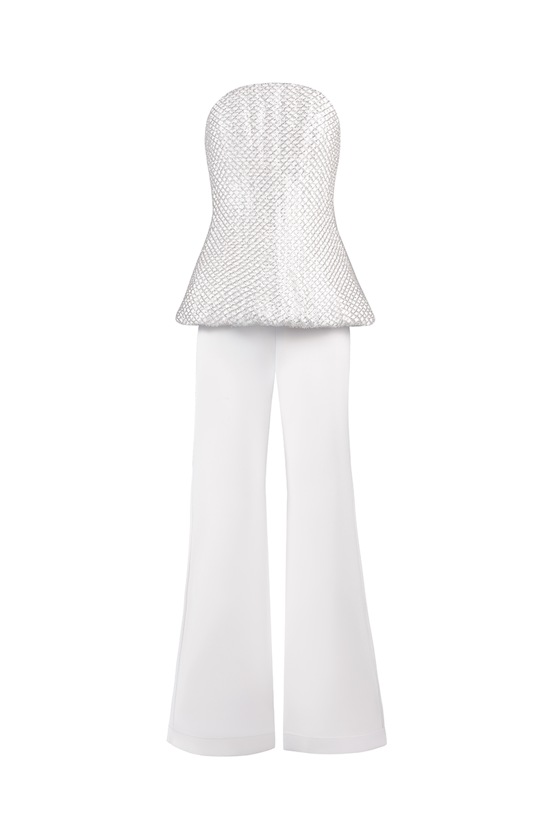 White Joanna Andraos corset top with flared trousers co-ord set, front view showing fitted corset and flowing trouser legs.