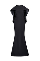Black cascade gown by Joanna Andraos featuring a flowing silhouette and elegant design, front view with intricate details.