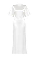 White Gabrijela T-shirt dress by Izakova, casual maxi dress with a relaxed fit and simple round neckline, displayed on a hanger.