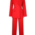 Red hourglass co-ord suit set by Joanna Andraos, featuring a stylish matching top and pants ensemble.