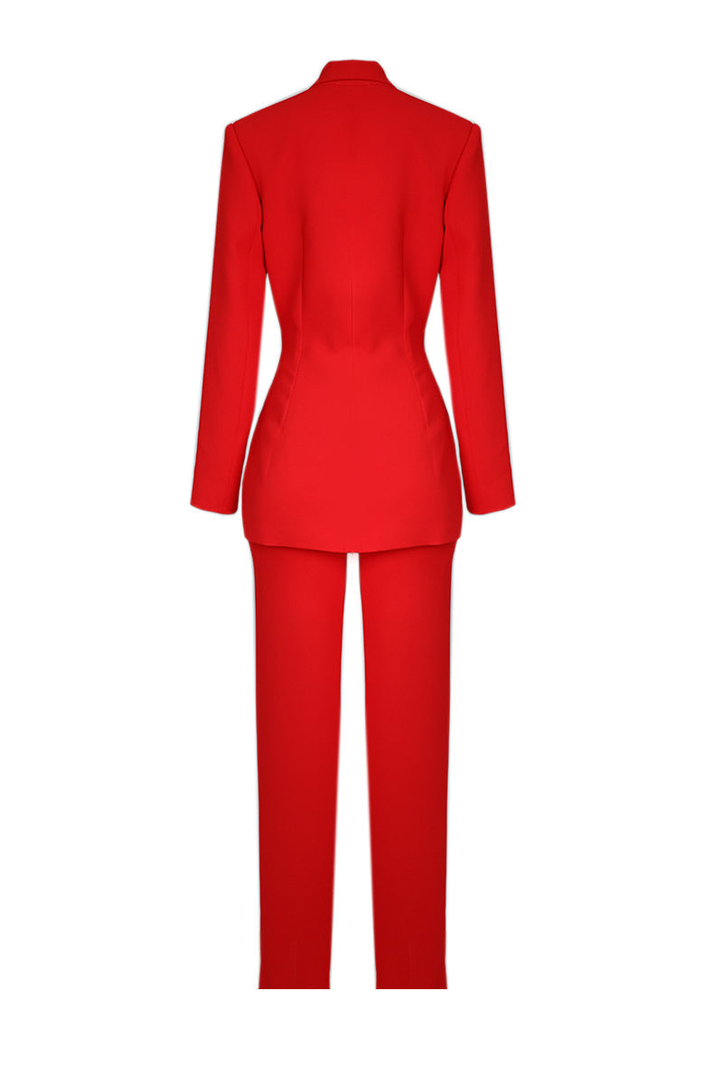 Joanna Andraos red hourglass co-ord suit set featuring a fitted jacket and matching pants, stylish and modern.