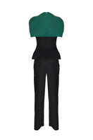 Joanna Andraos black co-ord set with top and pants, featuring a detachable emerald cape, styled for a chic look.