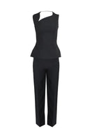 Joanna Andraos midnight black co-ords set with top and pants featuring a detachable emerald cape and ghost imagery design.