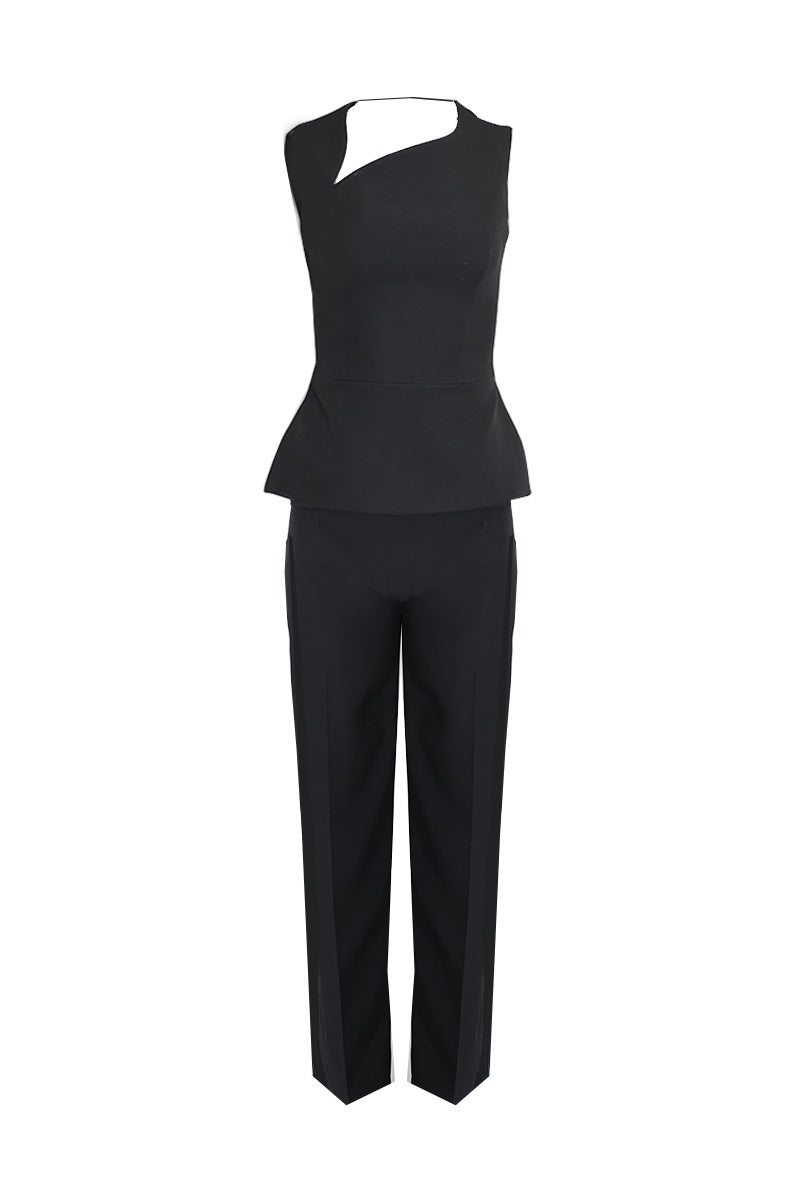 Joanna Andraos midnight black co-ords set with top and pants featuring a detachable emerald cape and ghost imagery design.