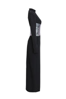 Joanna Andraos midnight black halterneck gown with metallic draped waist, side view showing elegant silhouette and stylish design.