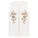 Silk Blossom embroidered shirt by Delegan displayed on a ghost mannequin, showcasing intricate floral embroidery and elegant design.