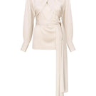 Pearl white wrapped blouse by DELEGAN displayed on a ghost mannequin, front view showing elegant design and fabric details.